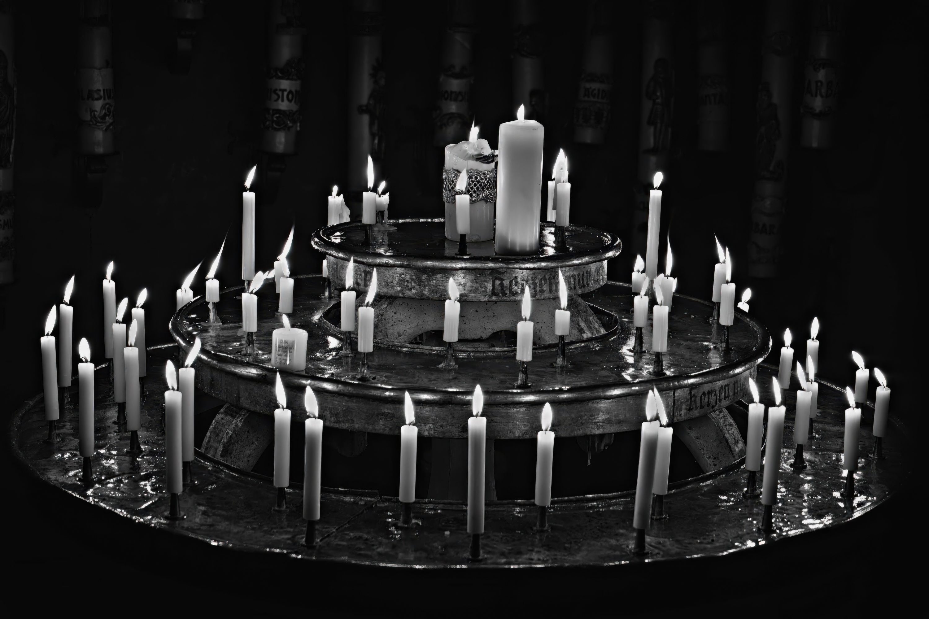 Rows of Candles on a Tiered Offering Stand
